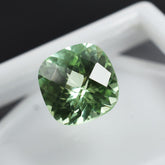 10.64 carat bluish-green natural grandidierite gemstone, cushion cut, certified.